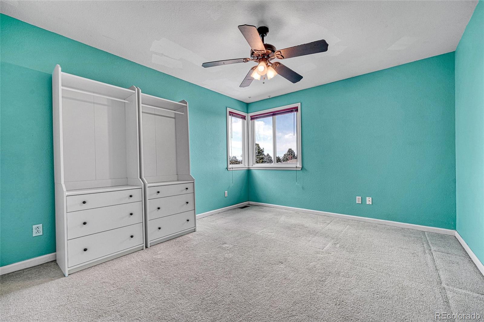 9247 Sugarstone Circle Highlands Ranch, CO 80130 - Photo 25 of 48 a view of an empty room with a window