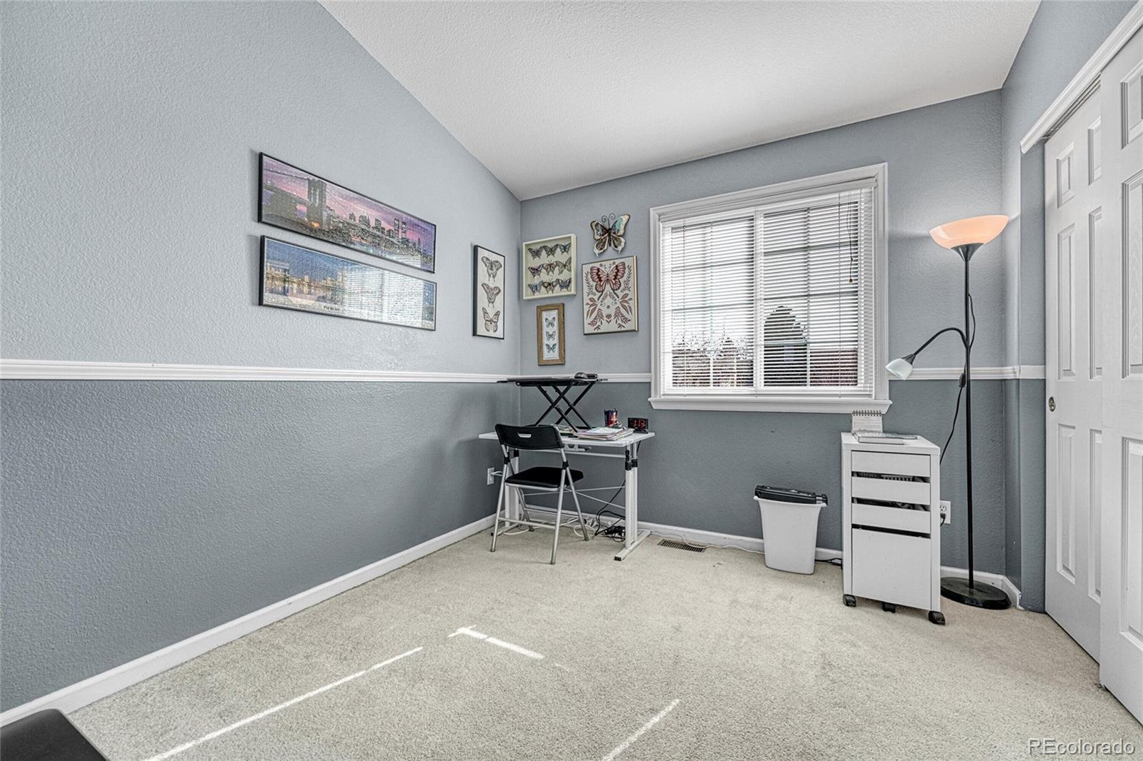 9247 Sugarstone Circle Highlands Ranch, CO 80130 - Photo 27 of 48 a workspace with furniture