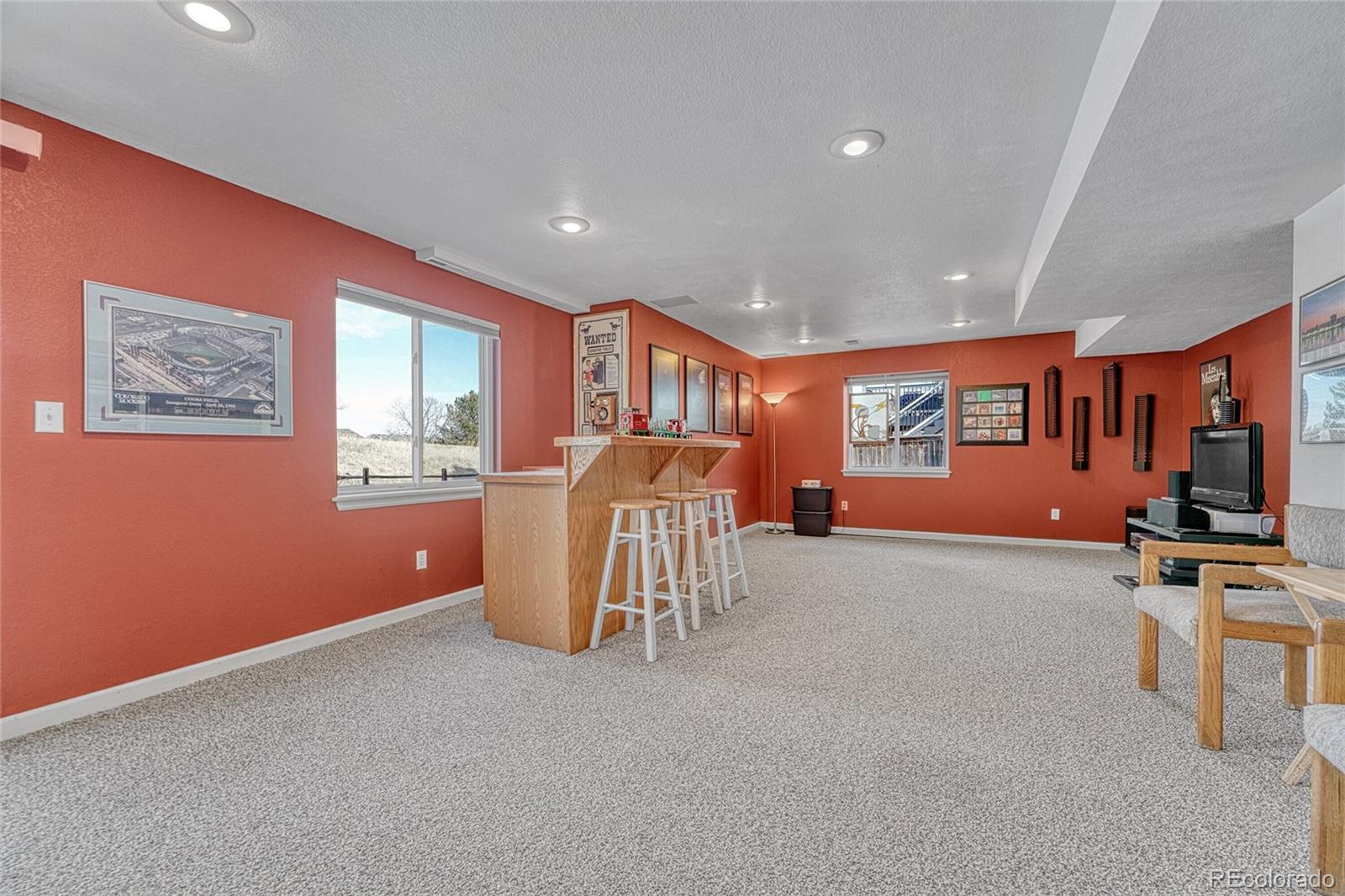 9247 Sugarstone Circle Highlands Ranch, CO 80130 - Photo 32 of 48 a room with furniture and window