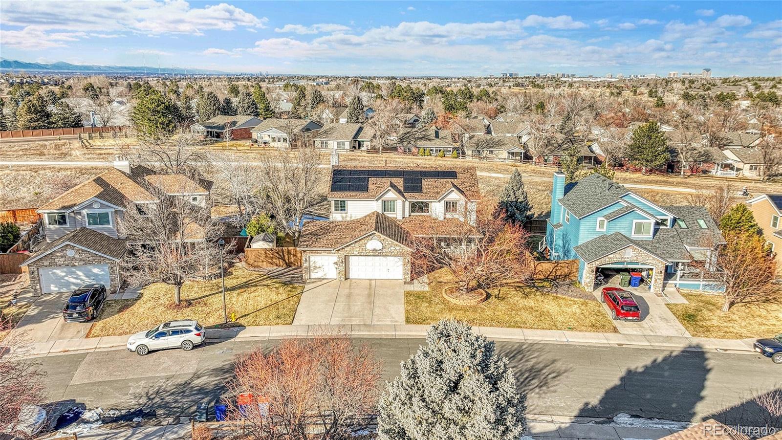9247 Sugarstone Circle Highlands Ranch, CO 80130 - Photo 41 of 48 an aerial view of residential houses with outdoor space