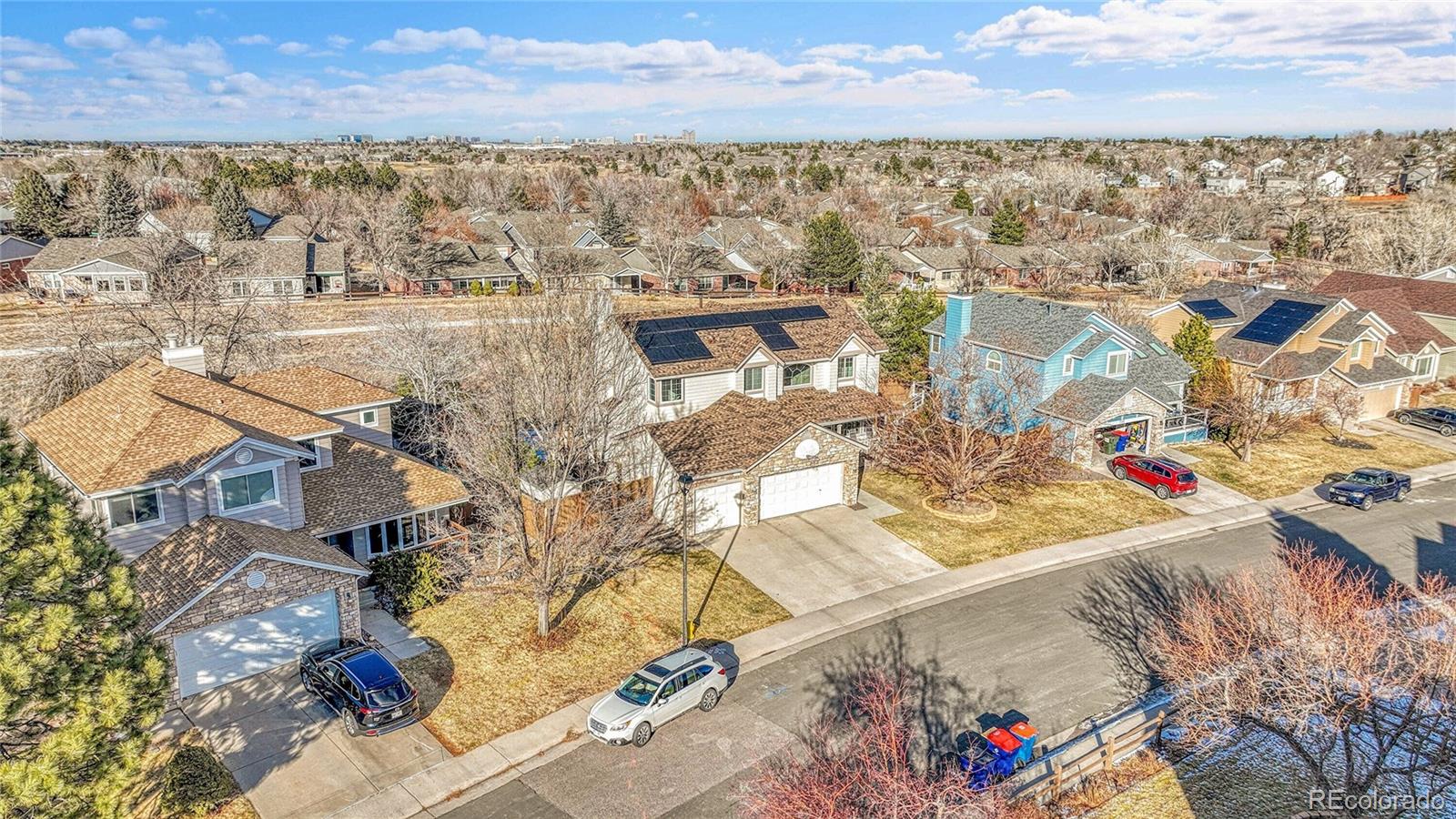 9247 Sugarstone Circle Highlands Ranch, CO 80130 - Photo 44 of 48 an aerial view of residential houses with outdoor space