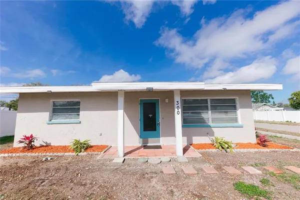 a view of a house with a patio