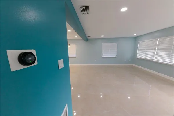 a room with furniture and window