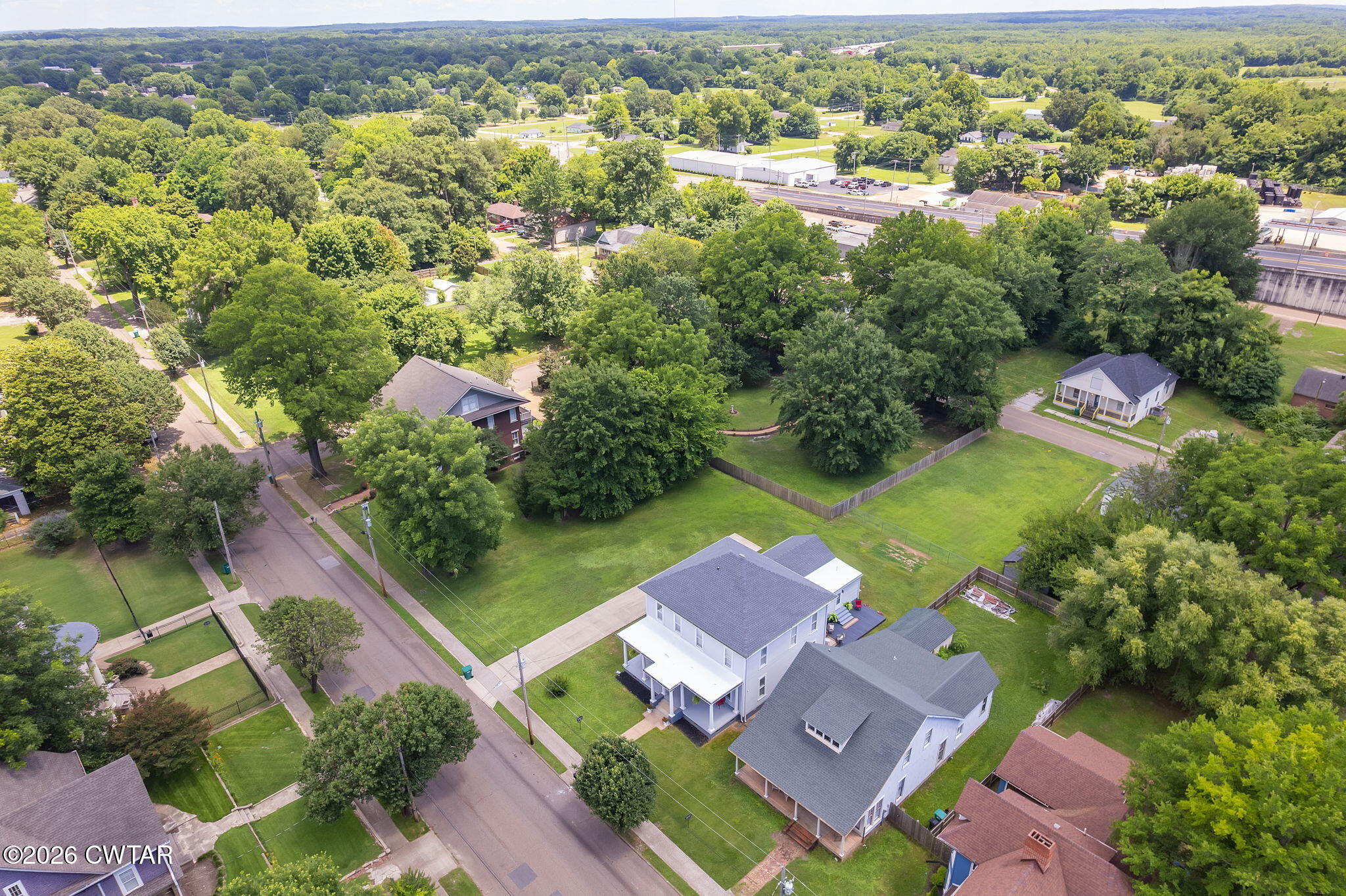 554 East Main Street Jackson, TN 38301 - Photo 51 of 60 an aerial view of residential houses with outdoor space and trees