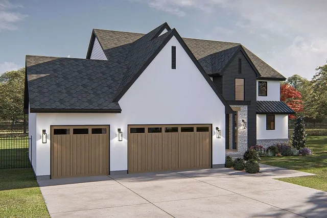a front view of a house with garage