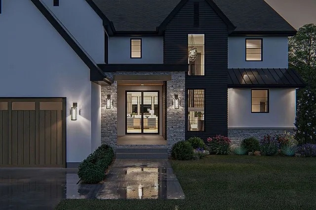 a front view of a house with garden