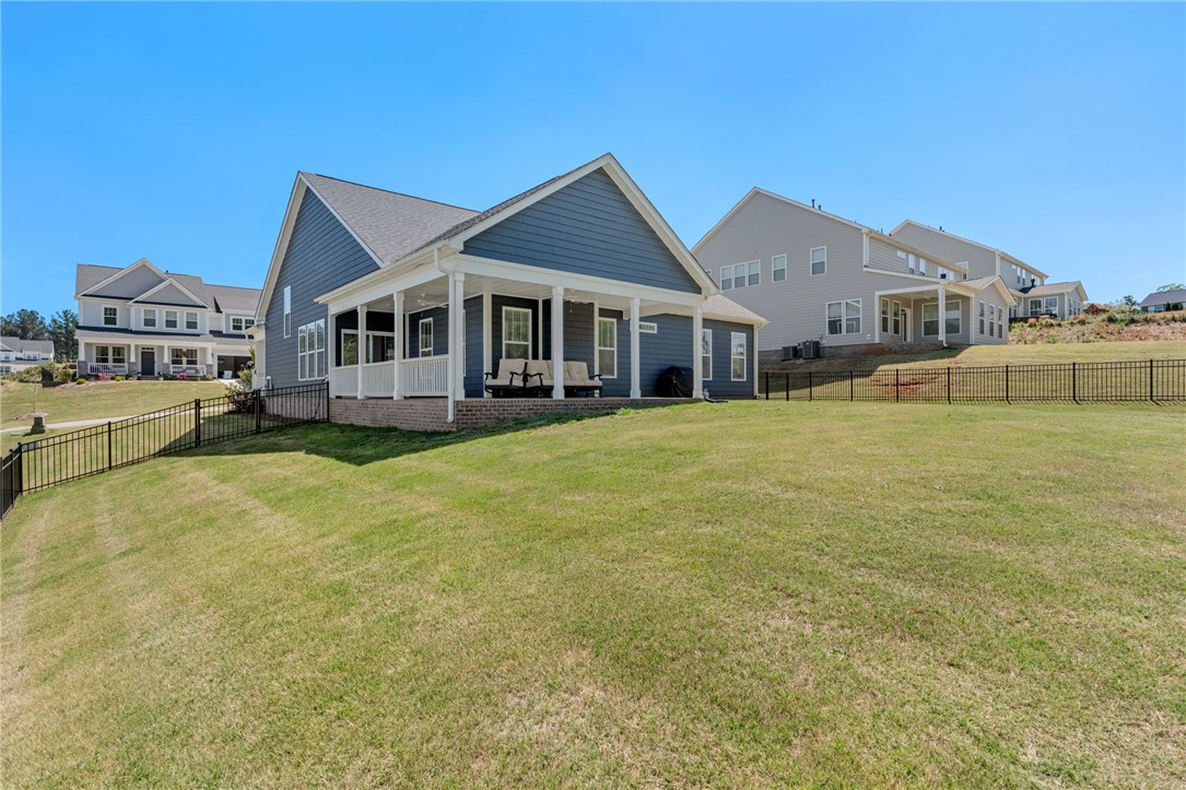 210 Maverick Trail Central, SC 29630 - Photo 33 of 41 This charming home offers a sprawling backyard, perfect for outdoor enjoyment and relaxation.