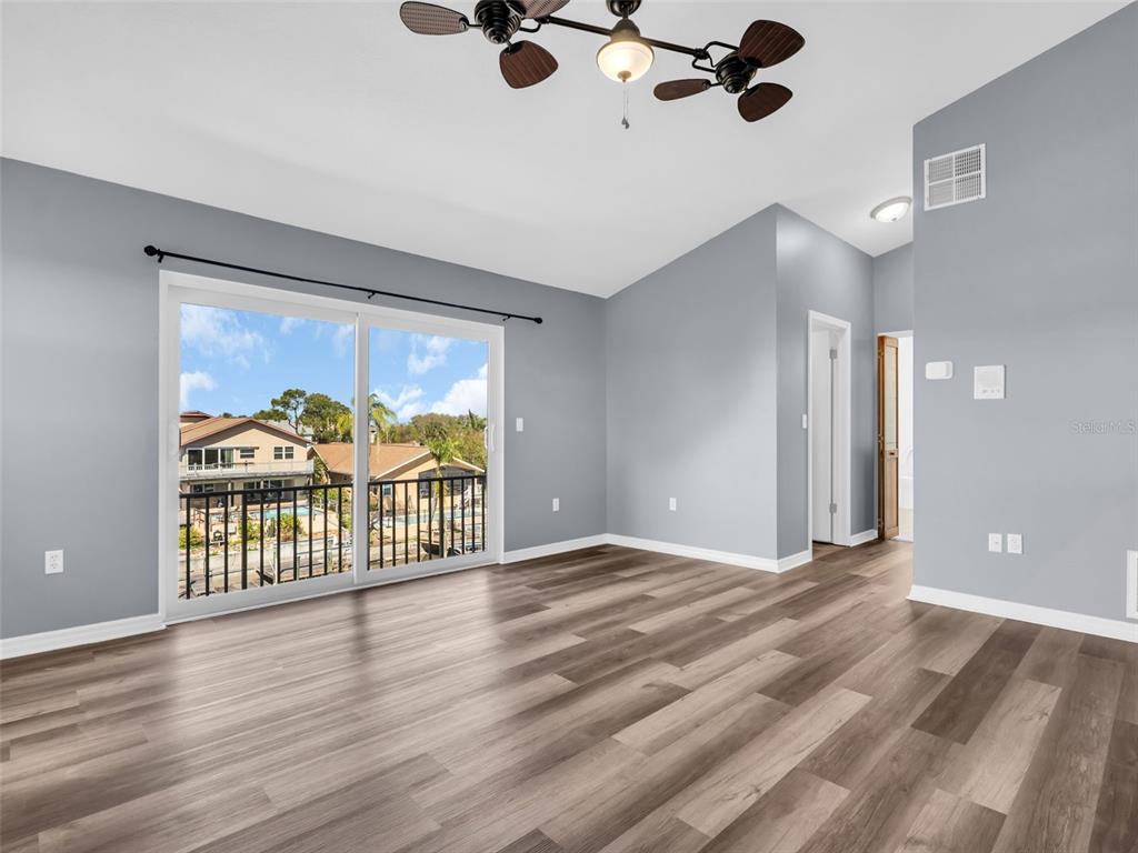 6241 Bayside Drive New Port Richey, FL 34652 - Photo 26 of 78 a view of livingroom with furniture and wooden floor