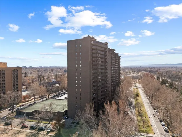 a workspace with furniture and window