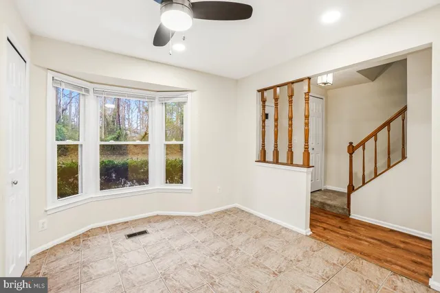 a kitchen with stainless steel appliances granite countertop a stove sink and cabinets
