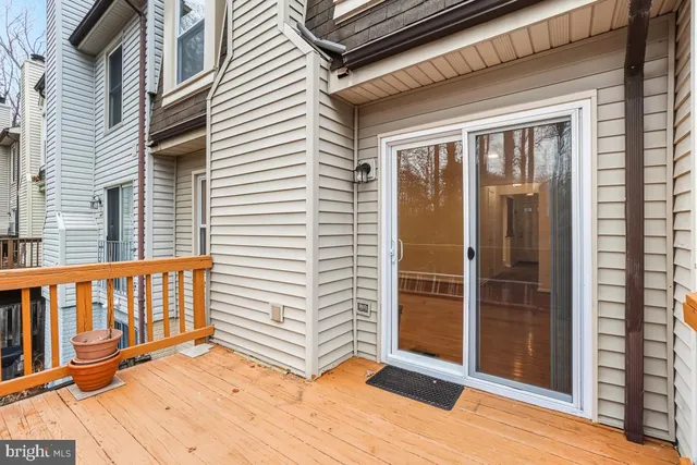 a bathroom with a granite countertop sink toilet bathtub and shower