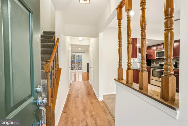 a view of a kitchen from the hallway