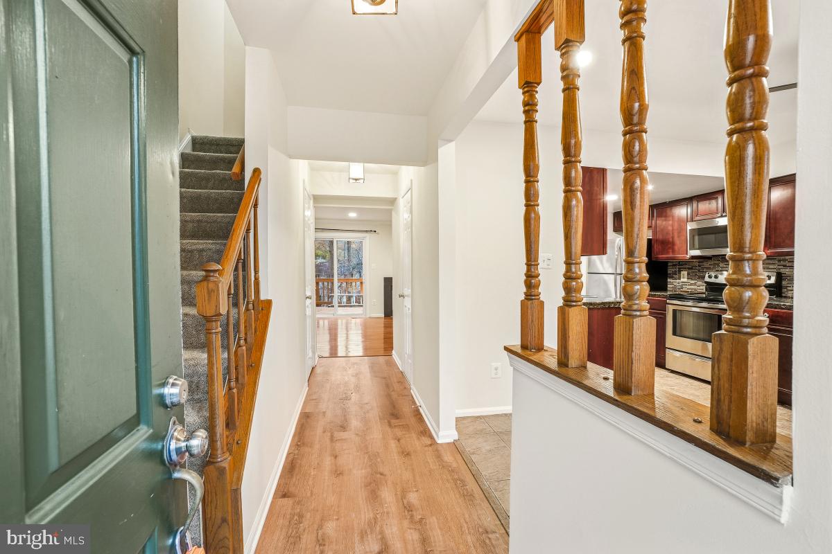 9040 Armendown Drive Springfield, VA 22152 - Photo 3 of 30 a view of a kitchen from the hallway