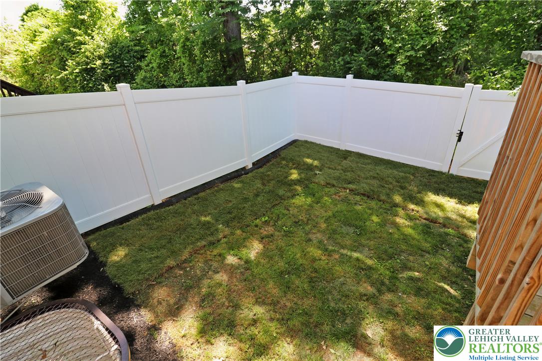 4502 Benjamin Court Emmaus, PA 18049 - Photo 18 of 53 A well-maintained fenced yard offers a private outdoor retreat.