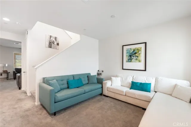 a living room with furniture and a couch