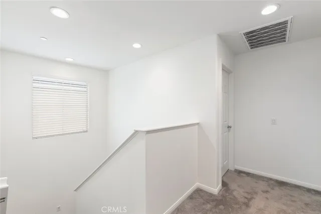 a bedroom with toys and a book shelf