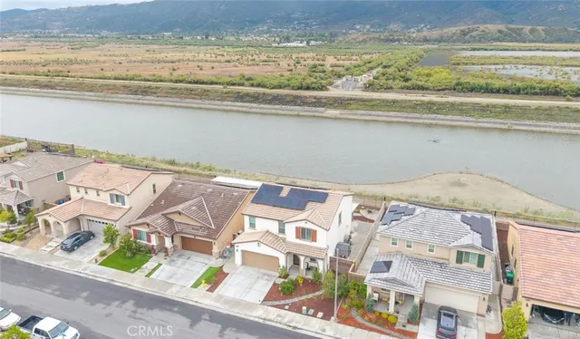 a aerial view of a house with a swimming pool