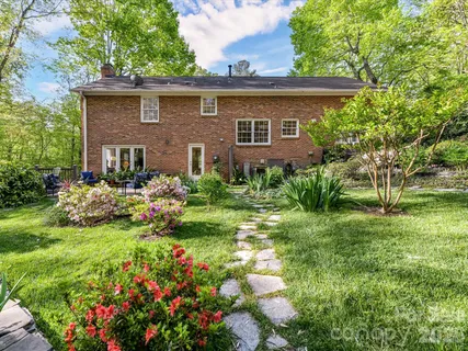 a garden view with a seating space