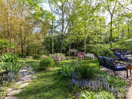 a view of backyard with green space