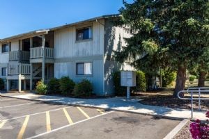 1051 East Central Avenue Sutherlin, OR 97479 - Photo 2 of 9 a front view of a house with a yard
