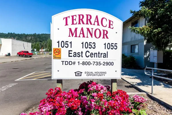 a sign on the side of a road