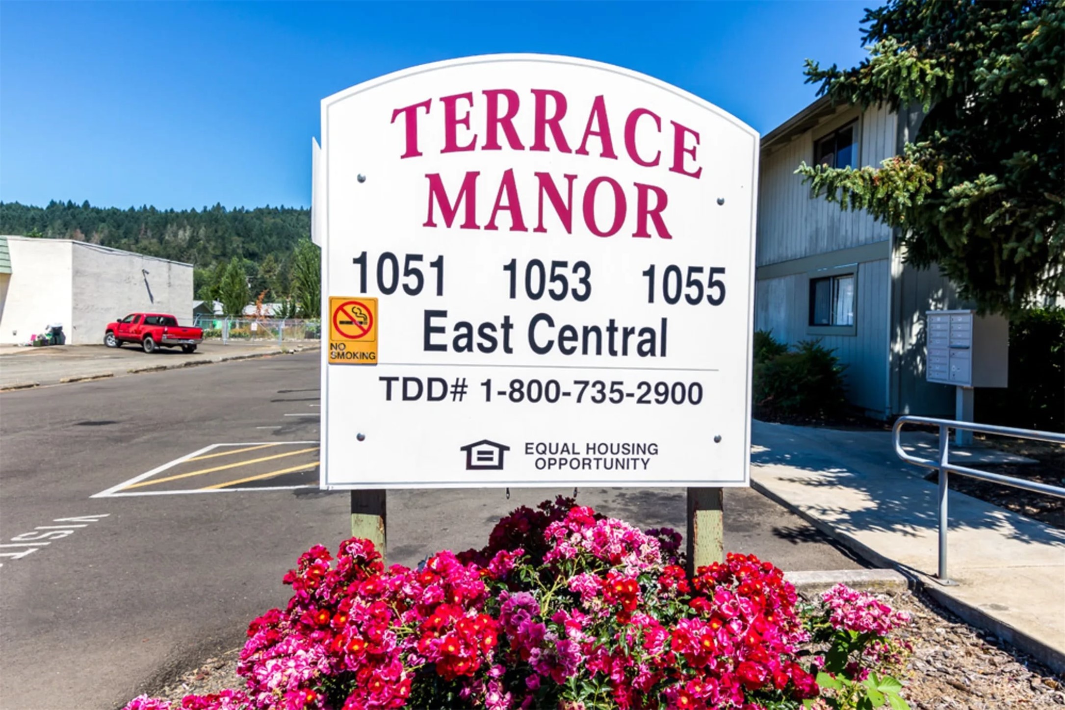 1051 East Central Avenue Sutherlin, OR 97479 - Photo 9 of 9 a sign on the side of a road