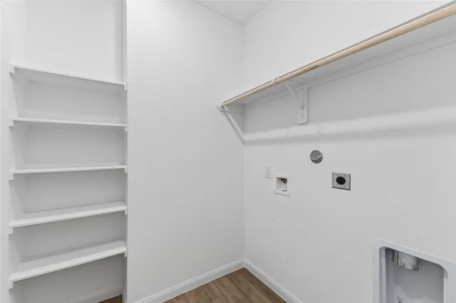 a view of an empty walk in closet