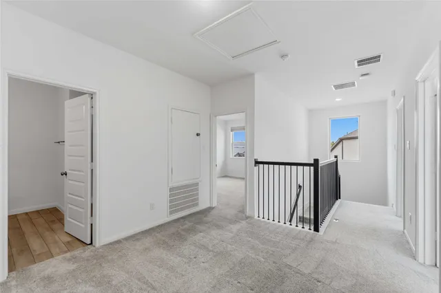 a bathroom with a sink toilet and vanity