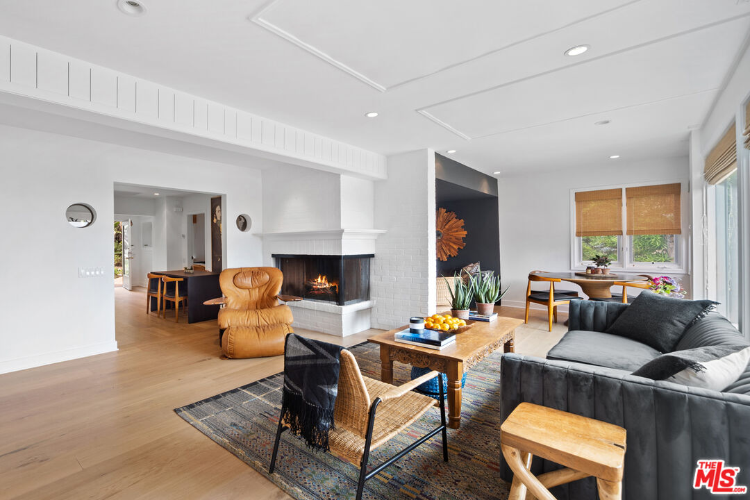 31008 Broad Beach Road Malibu, CA 90265 - Photo 30 of 41 a living room with furniture fireplace and a large window