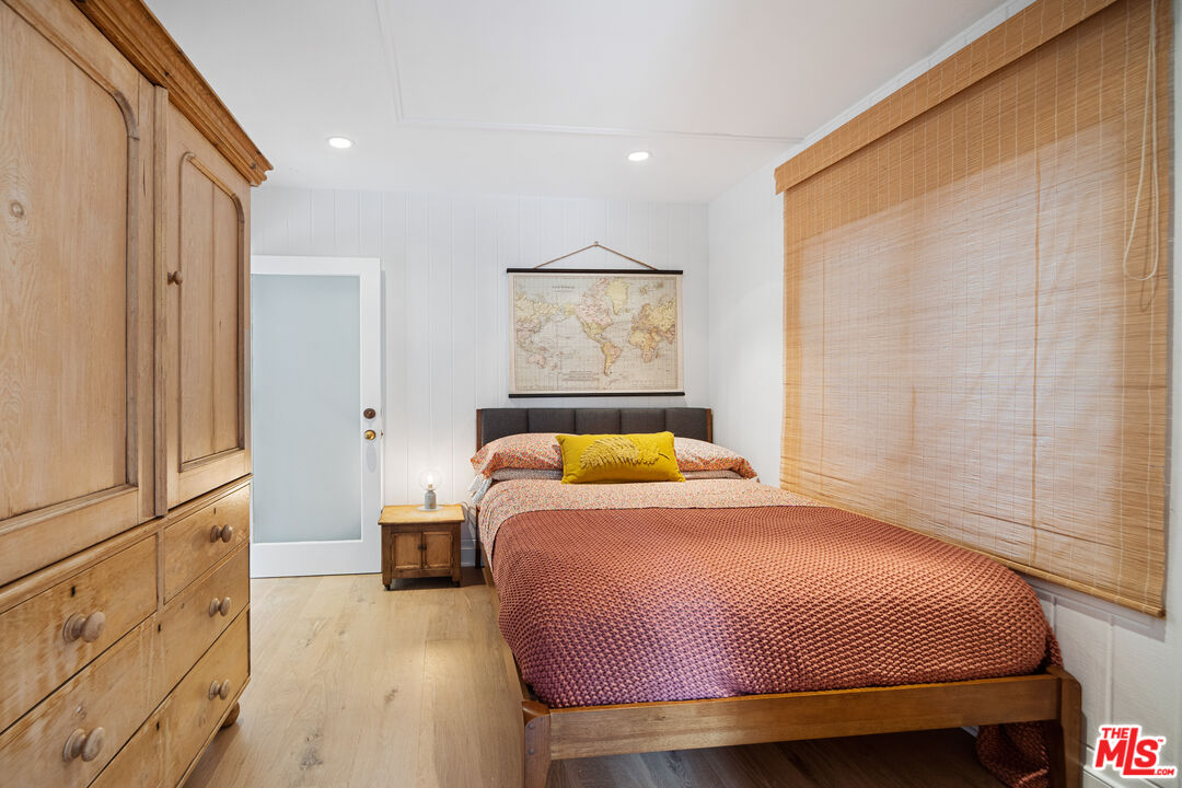 31008 Broad Beach Road Malibu, CA 90265 - Photo 36 of 41 a bedroom with a bed and window