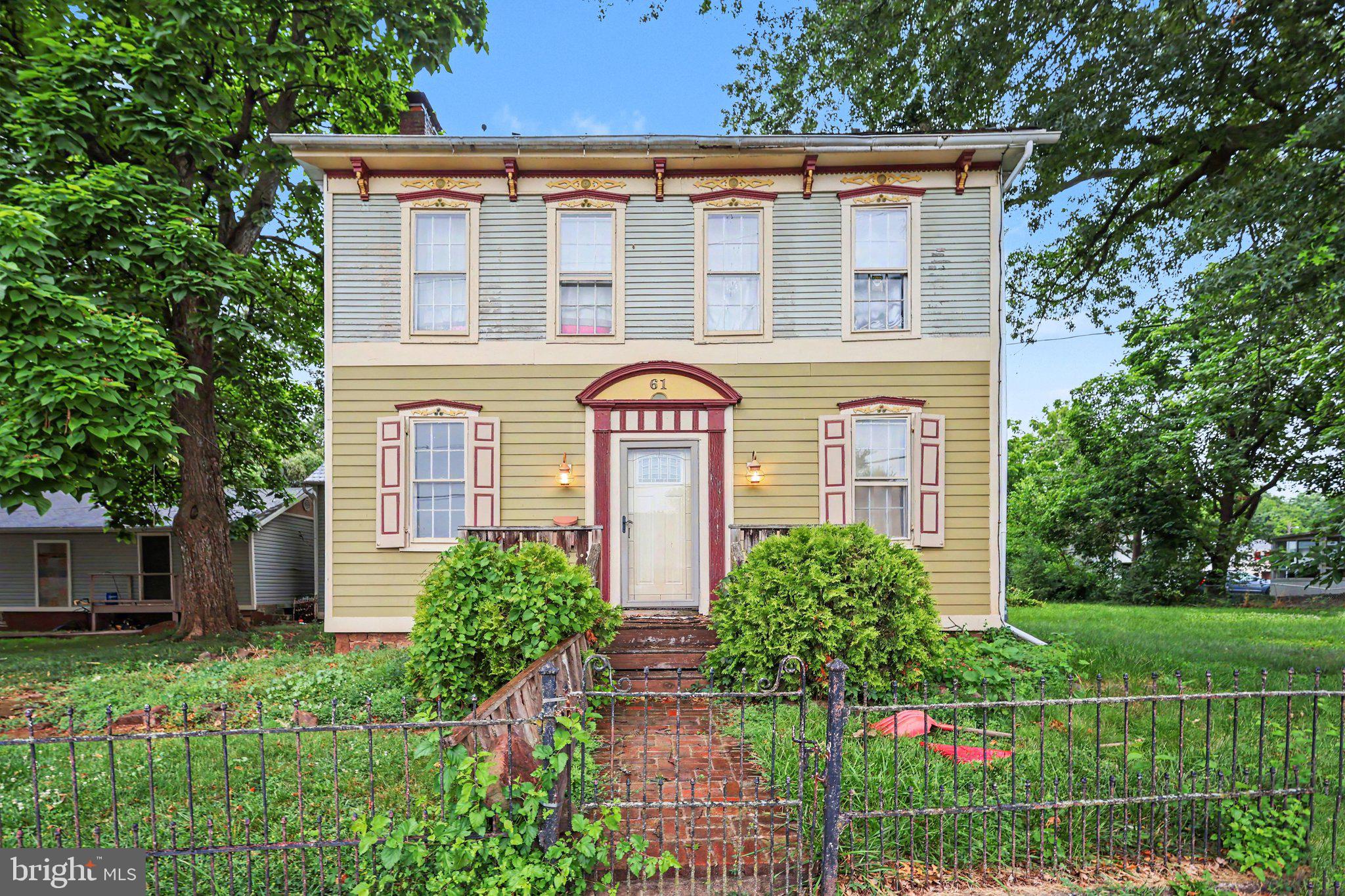 61 Mayfield Street Dover, PA 17315 - Photo 2 of 26 Charming vintage home with lush greenery.