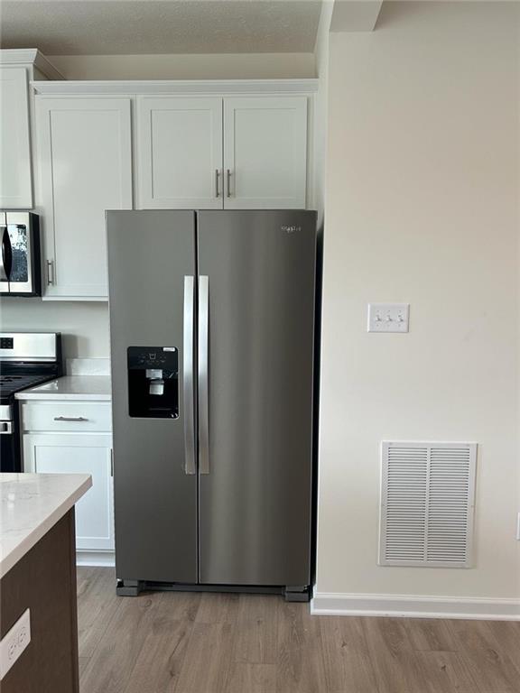 113 Affinity Drive Harmony, PA 16037 - Photo 40 of 40 a kitchen with metallic refrigerator freezer and a dishwasher