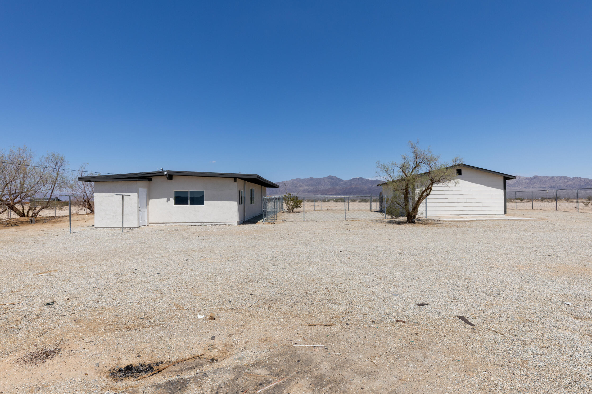 84417 Amboy Road Twentynine Palms, CA 92277 - Photo 19 of 23 a house with a outdoor space