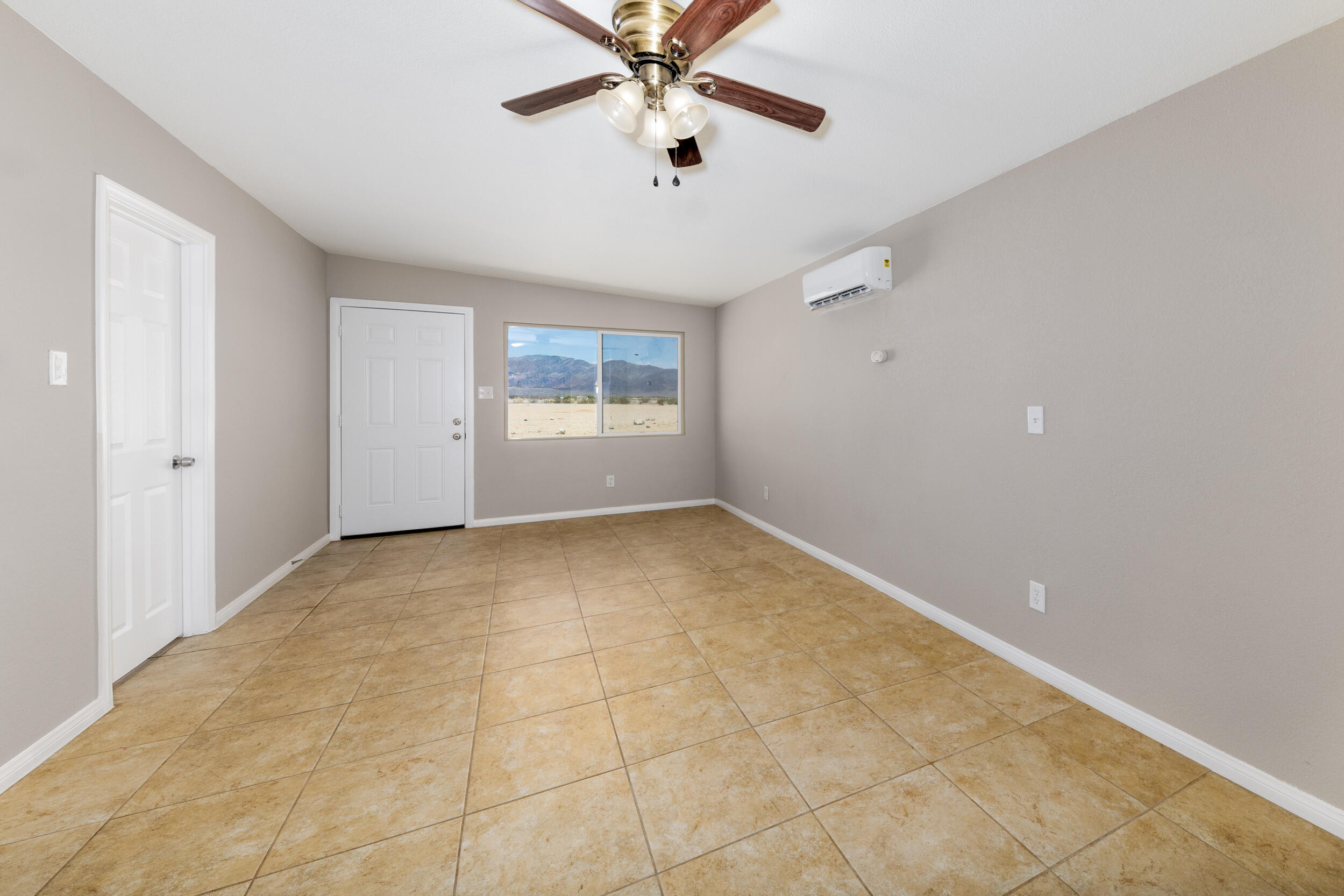84417 Amboy Road Twentynine Palms, CA 92277 - Photo 5 of 23 a view of an empty room with a window