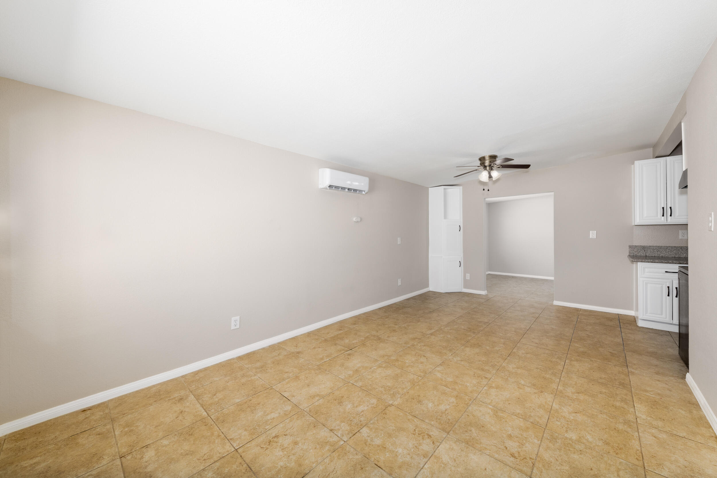84417 Amboy Road Twentynine Palms, CA 92277 - Photo 6 of 23 an empty room with a cabinet and mirrors