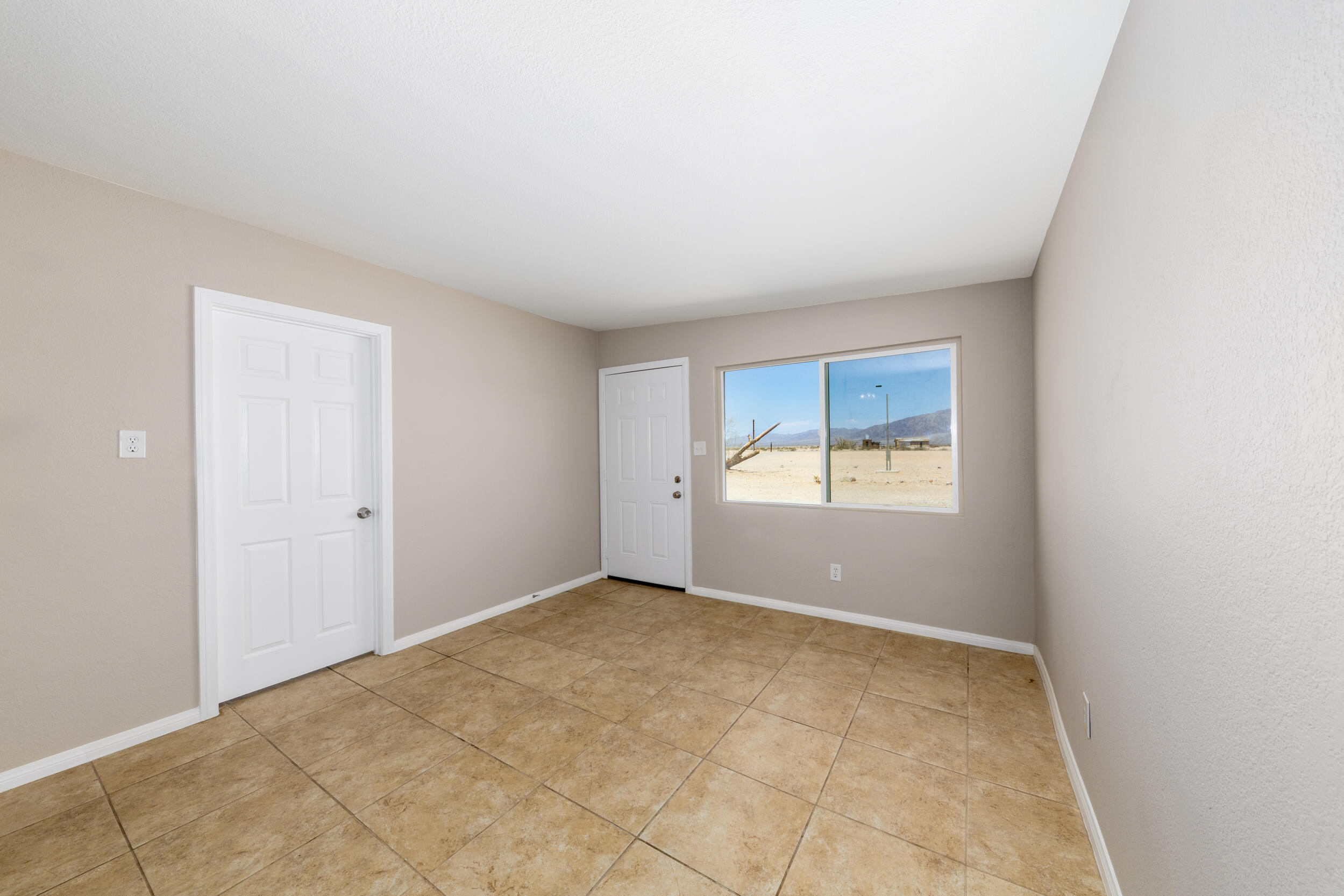 84417 Amboy Road Twentynine Palms, CA 92277 - Photo 7 of 23 a view of empty room with window
