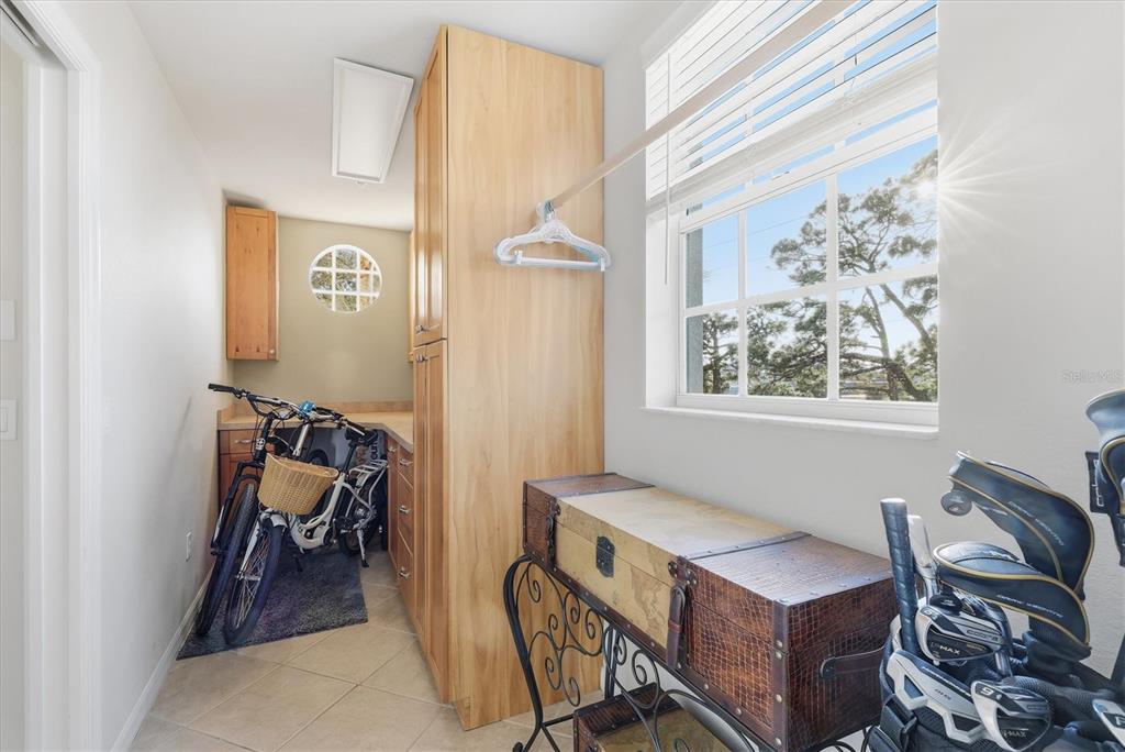 980 Cooper Street, Unit 201 Venice, FL 34285 - Photo 28 of 87 a view of a workspace with furniture and a window