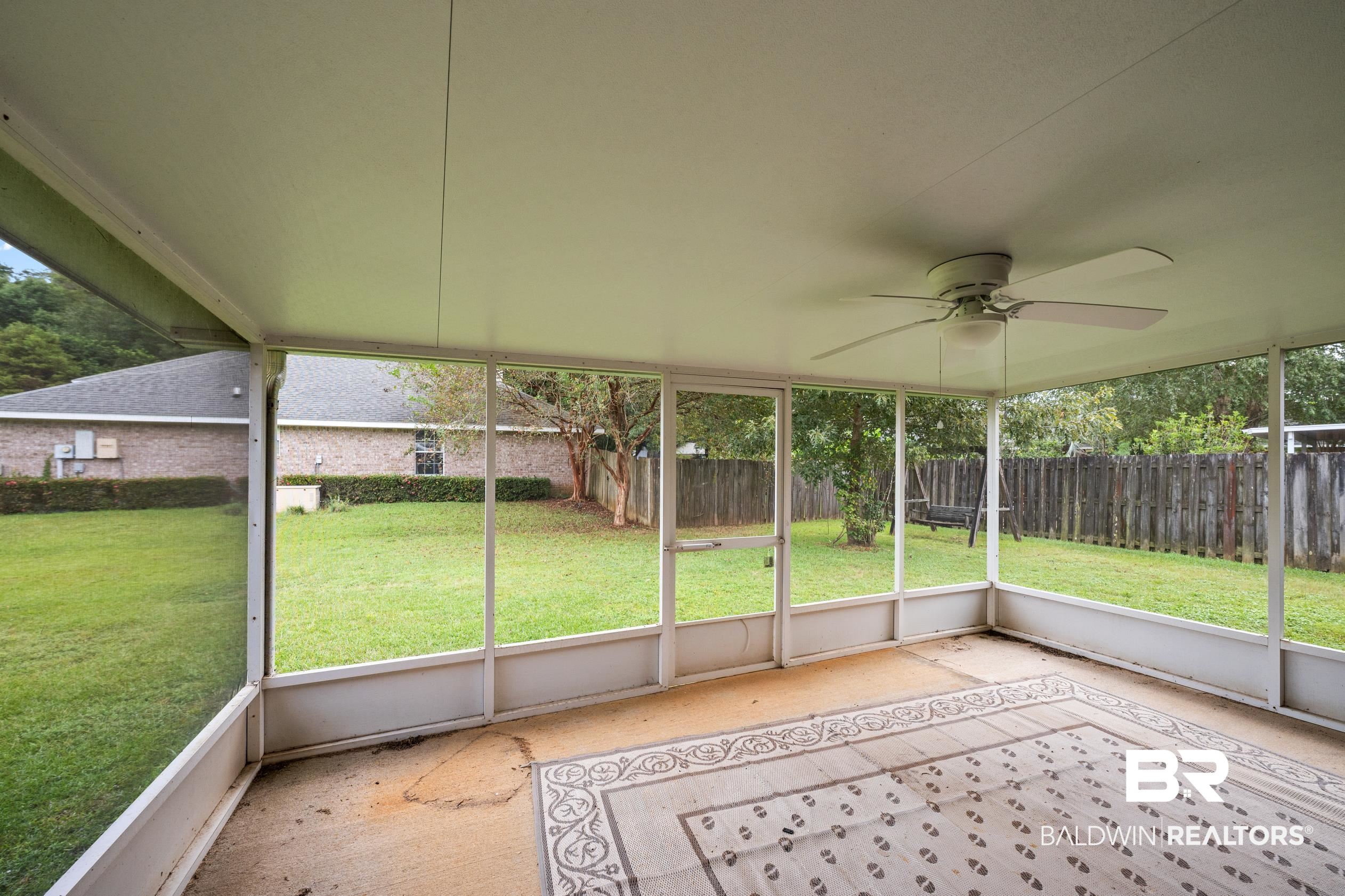 306 Monteith Oaks Drive Foley, AL 36535 - Photo 26 of 38 Unfurnished sunroom with ceiling fan