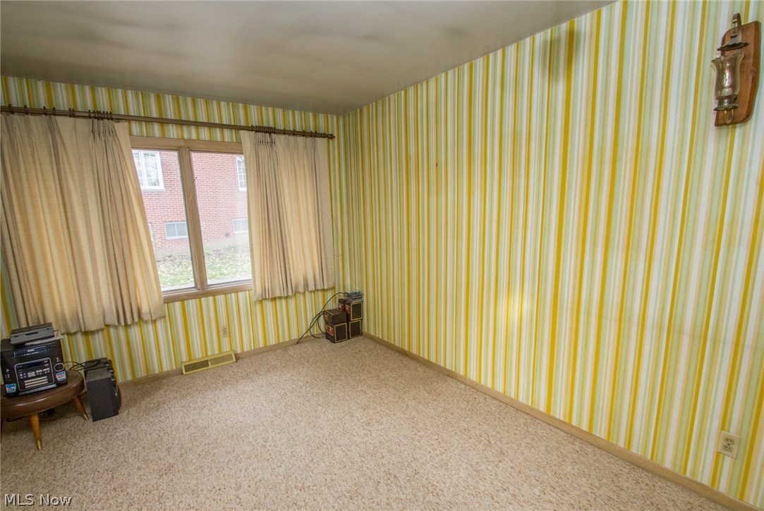 7700 Montello Road Independence, OH 44131 - Photo 12 of 28 Family room with access to patio