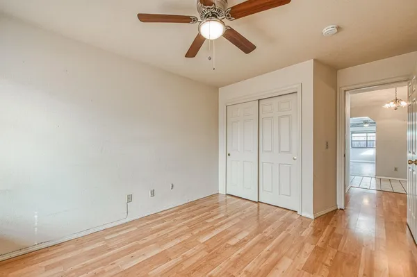 a view of a house with a yard and a large window
