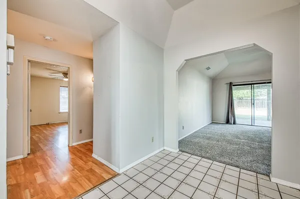 a kitchen with stainless steel appliances a sink dishwasher stove and oven with cabinets