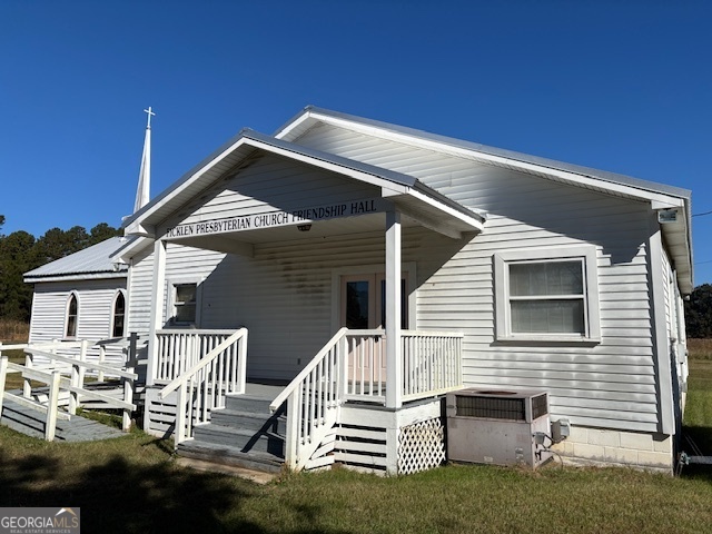 4316 Sharon Road Washington, GA 30673 - Photo 10 of 30 a view of a house with a patio