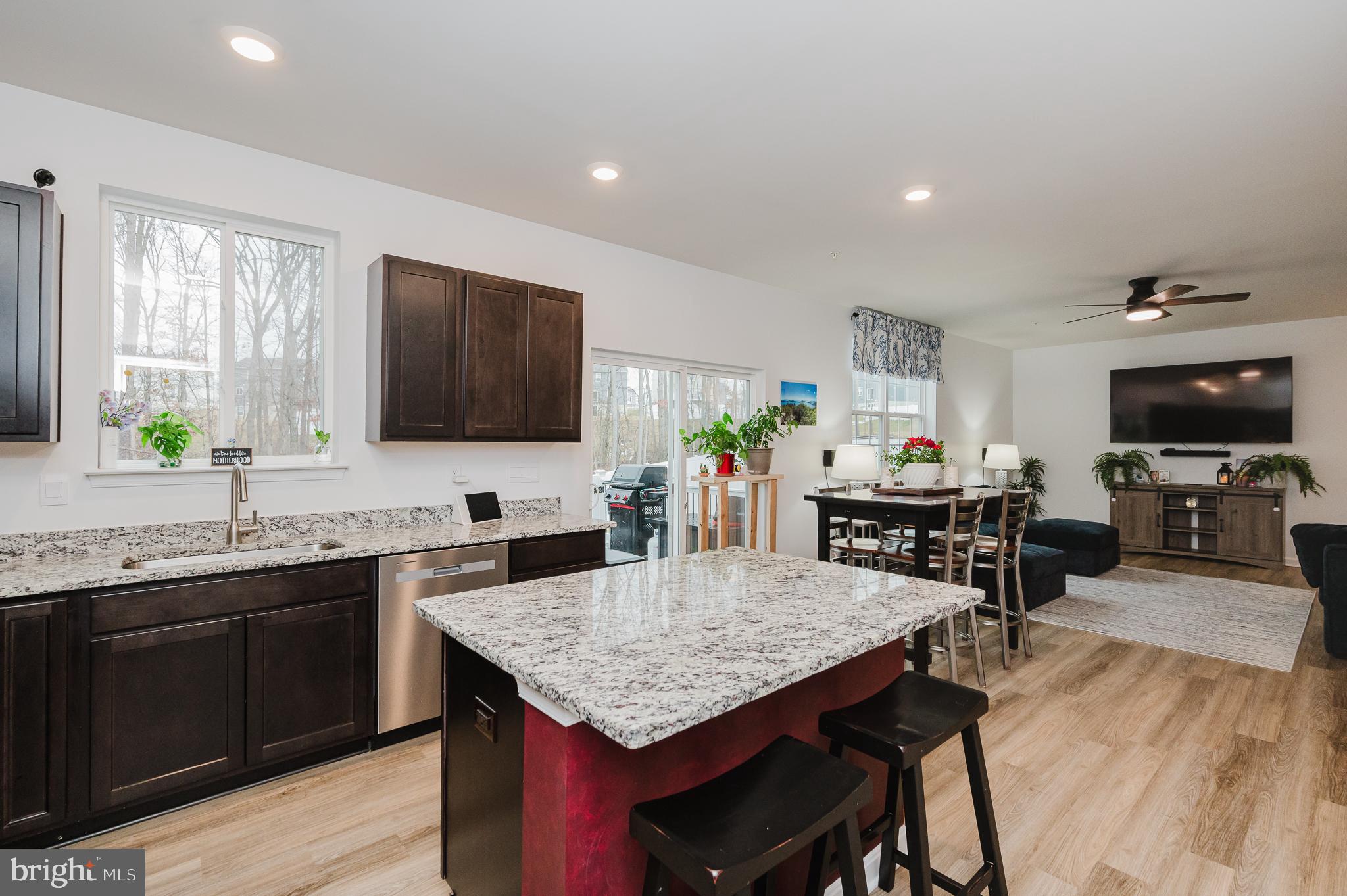 976 Pagonia Road Joppa, MD 21085 - Photo 13 of 69 a kitchen with granite countertop lots of counter top space and dining table
