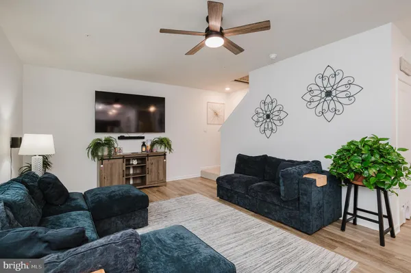 a view of bathroom with a sink and mirror