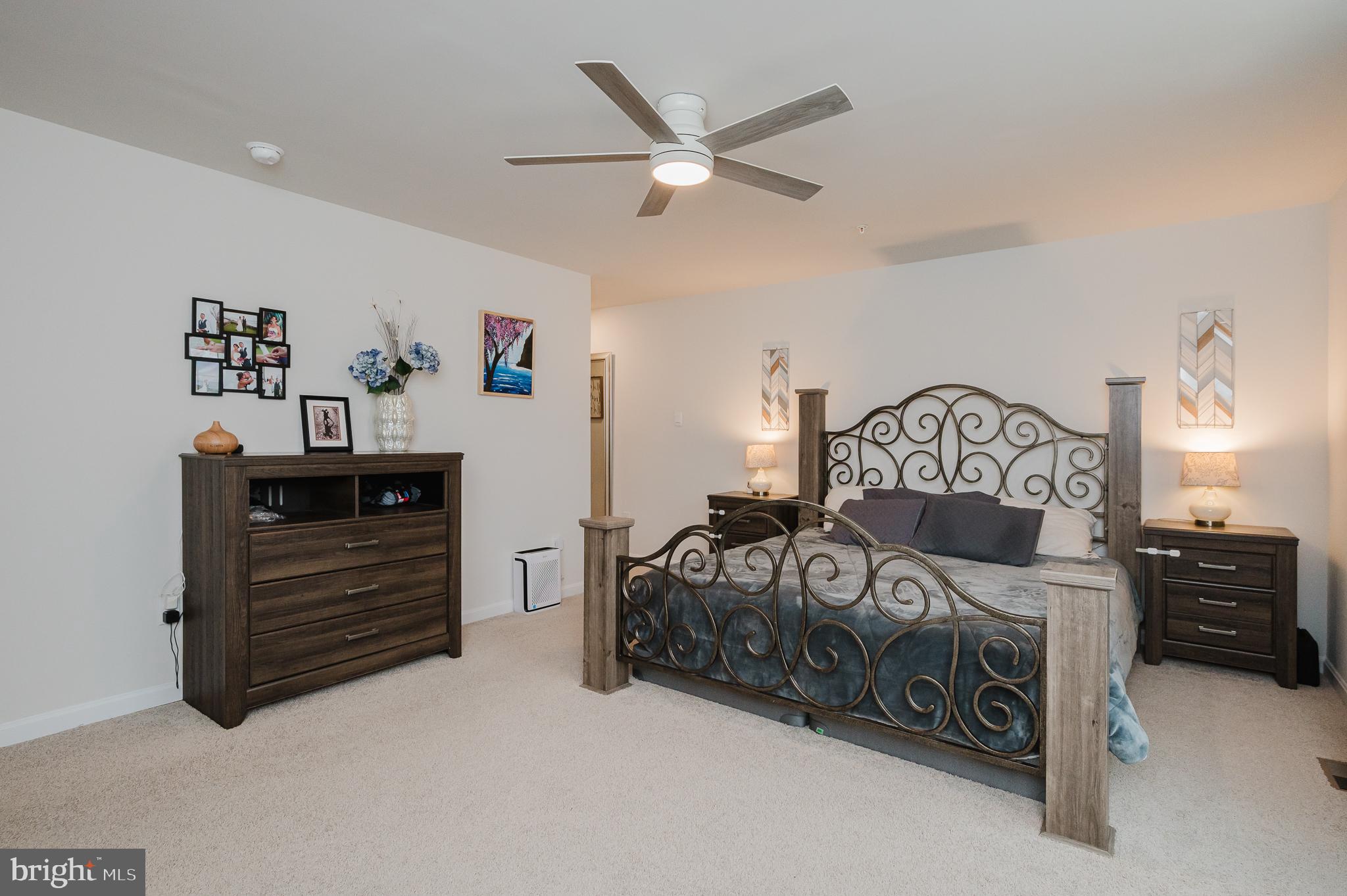 976 Pagonia Road Joppa, MD 21085 - Photo 24 of 69 a bedroom with a bed and a dresser