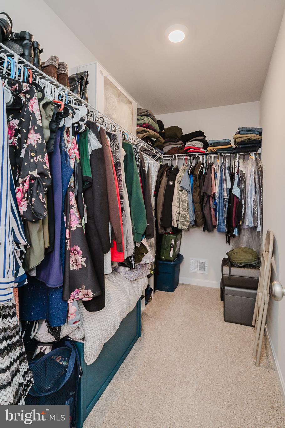 976 Pagonia Road Joppa, MD 21085 - Photo 26 of 69 a view of walk in closet with clothes