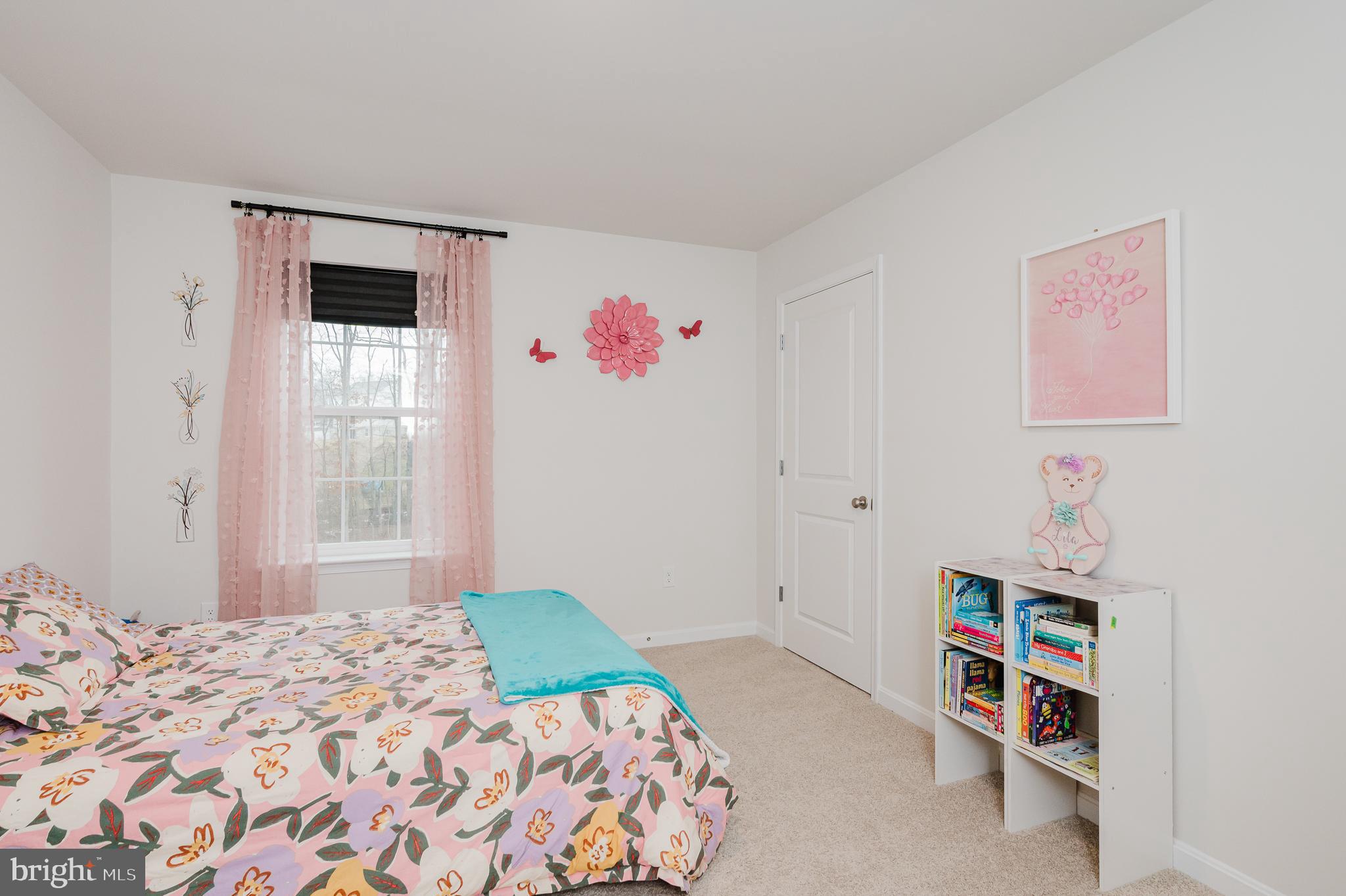 976 Pagonia Road Joppa, MD 21085 - Photo 38 of 69 a bedroom with a bed and a window