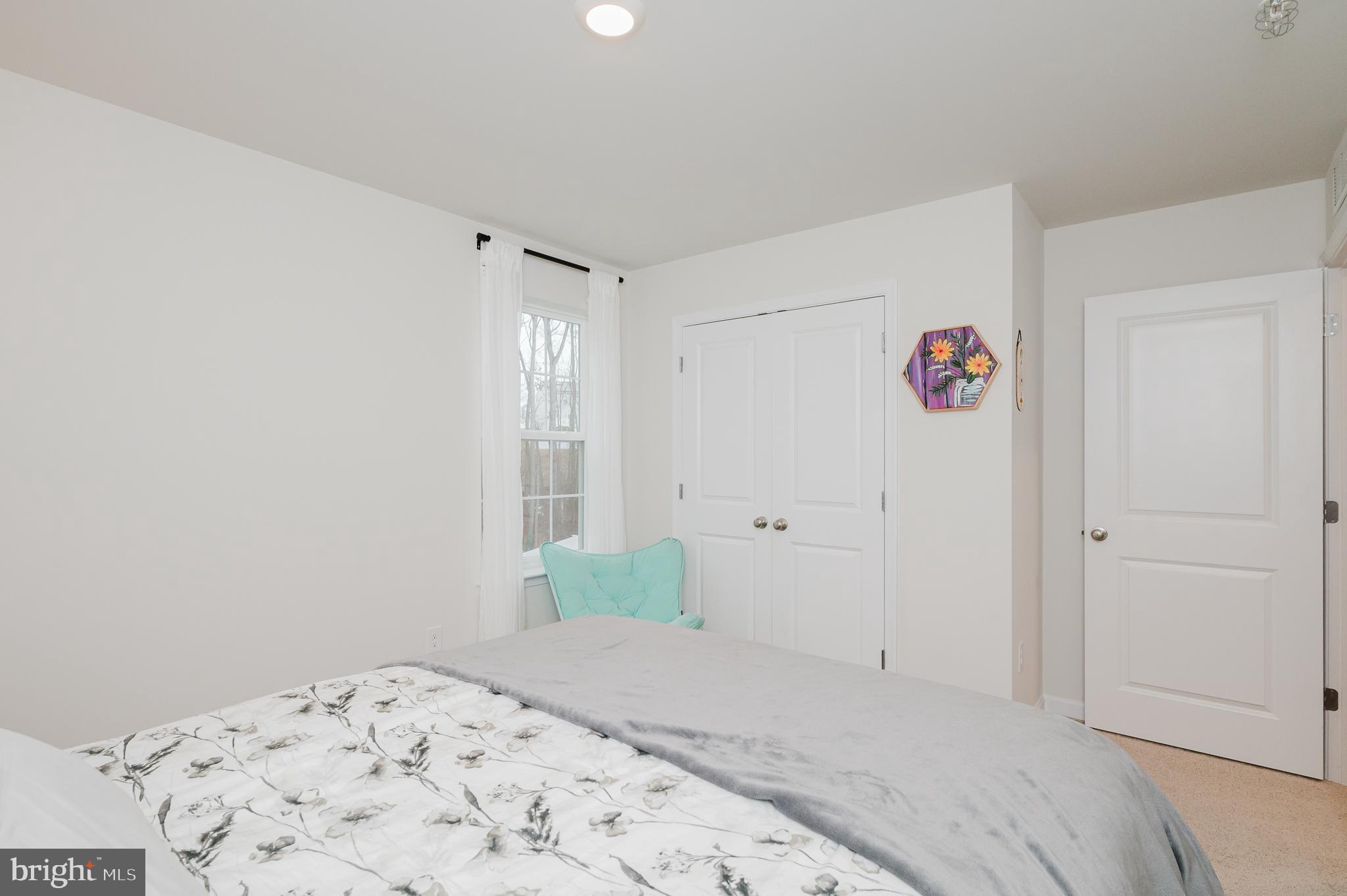 976 Pagonia Road Joppa, MD 21085 - Photo 42 of 69 a bedroom with a bed and a window