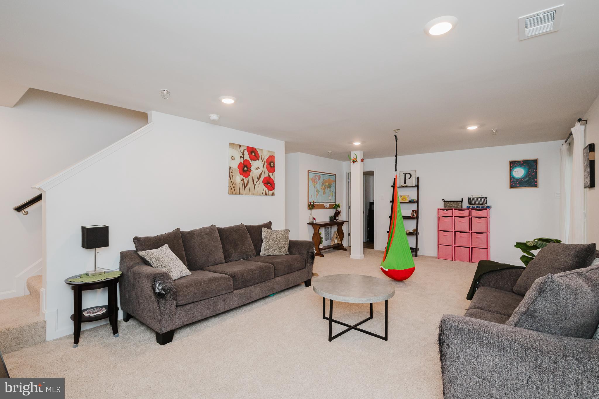 976 Pagonia Road Joppa, MD 21085 - Photo 46 of 69 a living room with furniture and a couch
