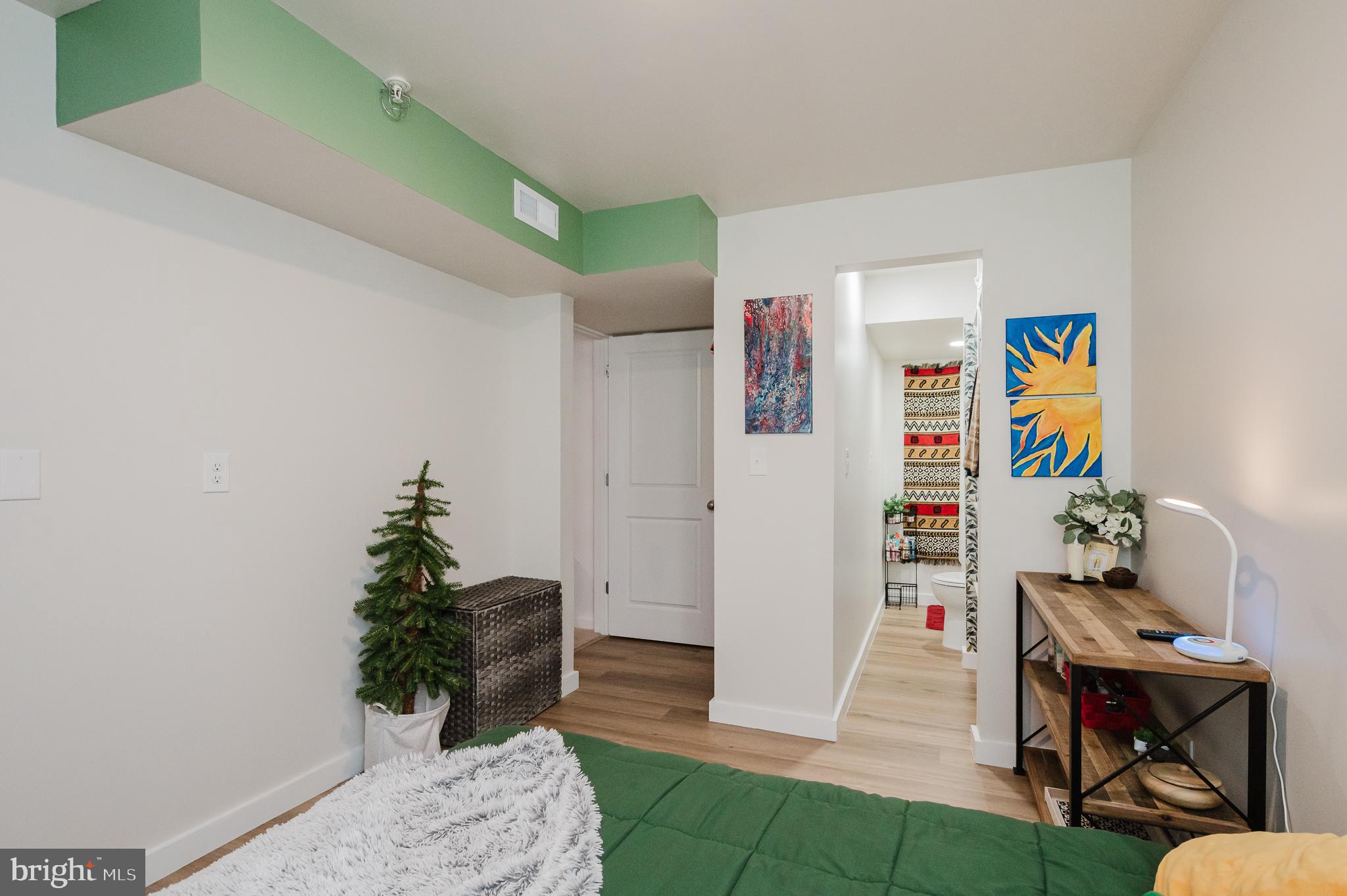 976 Pagonia Road Joppa, MD 21085 - Photo 50 of 69 a room with furniture and a potted plant